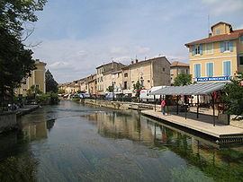 The village of L'Isle-sur-la-Sorgue, with the river in the foreground