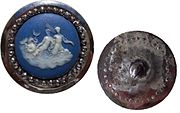 Wedgwood button with Boulton cut steels, depicting a mermaid & family, England, c. 1760. Diameter just over 32 mm (11⁄4")