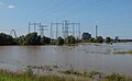 Weurt, Energie-Kohlekraftwerk mit Strommasten und der Oversteek bei Hochwasser in der Waal