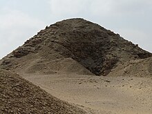 A ruined pyramid in the desert
