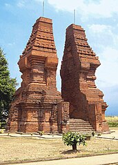 Wringin Lawang, the 15.5-meter tall red brick split gate in Trowulan, believed to be the entrance of an important compound.