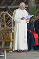 Pope Benedict XVI in white cassock (sometimes though unofficially called a simar) with pellegrina and fringed white fascia (2007)