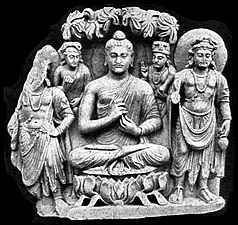 132 CE Gandhara Buddhist Triad from Sahr-i-Bahlol, similar to the dated Brussels Buddha, "Year 5", circa 132 CE.[22] Peshawar Museum.[66][67]