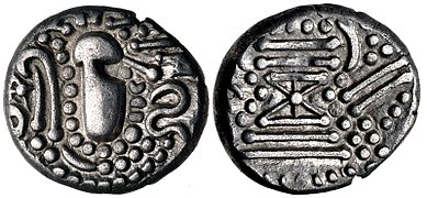 A Chaulukya-Paramara coin, c. 950-1050 CE. Stylized rendition of Chavda dynasty coins: Indo-Sassanian style bust right; pellets and ornaments around / Stylised fire altar; pellets around.[26]