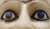 A closeup of the finely crafted eyes