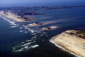Aerial view of a barrier island, temporarily separated into two segments.