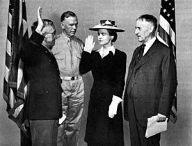 Oveta Culp Hobby being sworn in as the first WAAC by Major General Myron C. Cramer. General George C. Marshall, second from left, and Secretary of War Henry L. Stimson witness the ceremony. 16 May 1942.