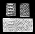 Jemdet Nasr-style Mesopotamian cylinder seal, from Grave 7304 Cemetery 7000 at Naqada, Egypt, Naqada II period. This is an example of early Egypt-Mesopotamia relations.[14]