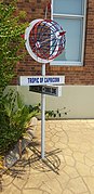 Monument marking Tropic of Capricorn near Civic Centre, Longreach, at mid-day of Summer solstice 2019. The monument is few arc seconds South of Tropic of Capricorn(notice shadow directly below the sign)