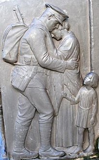 Relief on the St Annes on Sea War Memorial. A soldier says farewell to his wife and child.