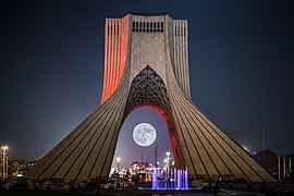 Azadi Tower during a full moon