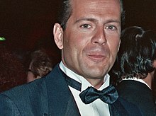 Portrait of Bruce Willis looking to his right