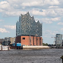 An image of Herzog and de Meuron's Elbe Philharmonie, Hamburg. Notes from Modernism describes it an example of the metamodernism in architecture.