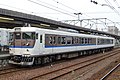 Hiroshima refurbished livery (115-1000 series) in August 2009