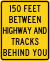 W10-11b XX feet between highway and tracks behind you