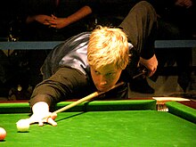 Neil Robertson playing a shot on the pink ball.