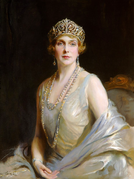 Portrait of Queen Victoria Eugenie wearing the fleurs-de-lis tiara, by Philip de László (1926).
