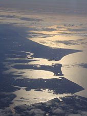 A high aerial view of Portsea Island (the island which Portsmouth is situated on), and neighbouring Hayling Island