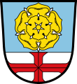 Gemeinde Guttenberg Über silbernem Schildfuß, darin ein durchgehendes rotes Tatzenkreuz, in Blau eine goldene heraldische Rose mit silbernen Kelchblättern.