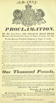 A poster with the coat of arms of the lieutenant governor of Upper Canada at the top and "Proclamation" in a large font. Further writing describes the warrant for William Lyon Mackenzie in 1837