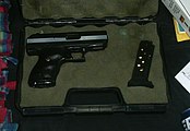 Hi-Point CF380 pistol with two-tone finish; the C-9 is identical except it is simply black, and chambered for 9×19mm Parabellum