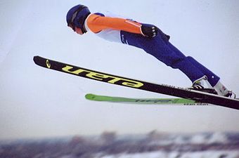 A ski jumper using the V-style