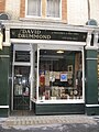 'Pleasures of Past Times', opened by David Drummond in 1967, who was for a time the longest-serving bookseller in Cecil Court. In later years it was run by his son Paul, and it closed in 2019. Currently (2023) Art Deco Gallery.