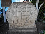 Classic period panel in the main plaza of Flores found in the nearby site of Ixlu.