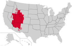 The Mormon corridor, highlighted in red. Striped counties contain major Mormon populations, but are not considered to be a part of the cardinal regions of their states.
