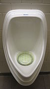 Waterless urinal in California