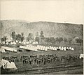 Artillery on guard over prisoners at Camp Rathburn, ca. 1864.
