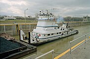 Towboat Elizabeth Marie departing main lock at McAlpine Locks on Ohio River, Louisville, Kentucky, USA, 1999
