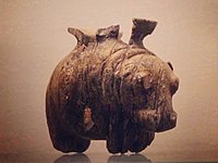 Vase in the shape of a hippopotamus. Early Predynastic, Badarian. 5th millennium BC. From Mostagedda. This vessel is carved from elephant ivory. The fine modeling and attention to detail show the skill in achieving these pieces.