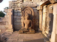 A Seated Buddha statue (Gupta temple).