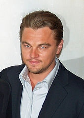 A picture of Leonardo DiCaprio in a dark suit
