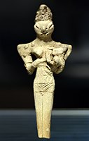 Late Ubaid; figurine of a lizard-headed nude woman nursing a child; terracotta and bitumen; c. 4000 BC; Iraq Museum