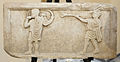 Roman cornu (left) and tuba (right) in a relief from the Museo Ostiense, Ostia Antica, Italy