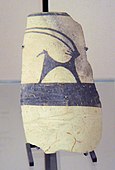 Fragment of pottery with a painting of an Ibex; 4700–4200 BC; painted ceramic; from Girsu; Louvre[37]