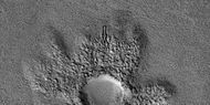 Close view of ejecta of pedestal crater, as seen by HiRISE under HiWish program. Arrow shows one of example of a boulder sitting in a pit. This image will be enlarged to better show this in the next two images.
