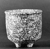 Footed bowl in granite, Syria, end of 8th millennium BC.