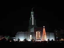 Large Mormon temple at night, with Christmas lights