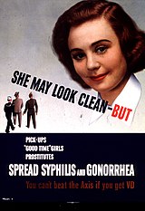 American poster propaganda targeted at World War II soldiers and sailors appealed to their patriotism in urging them to protect themselves. The text at the bottom of the poster reads, "You can't beat the Axis if you get VD." Images of women were used to catch the eye on many VD posters.