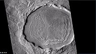 Crater with concentric crater fill, as seen by CTX (on Mars Reconnaissance Orbiter). Location is Casius quadrangle.