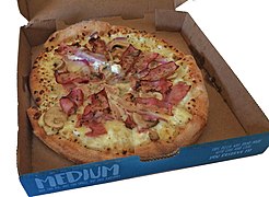 Pizza served in a cardboard box.