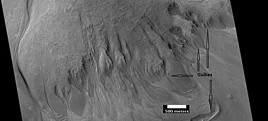 Gullies, as seen by HiRISE under HiWish program. Location is Nereidum Montes.