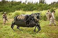 Legged Squad Support System (LS3) walks around the Kahuku Training Area during RIMPAC 2014. The LS3 is experimental technology being tested by the Marine Corps Warfighting Lab.
