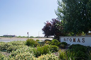 Natomas marker sign (right foreground) and Sleep Train Arena (now demolished) (left background)