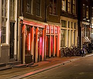 Rooms illuminated by red lights in De Wallen, Amsterdam, Netherlands
