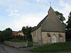 Kerk Notre-Dame en de kerkhofmuur van Boutonville, en het ensemble van de kerk, het kerkhof, het plein en de weg rondom