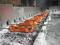 Lechon, whole roasted pig, stuffed with spices